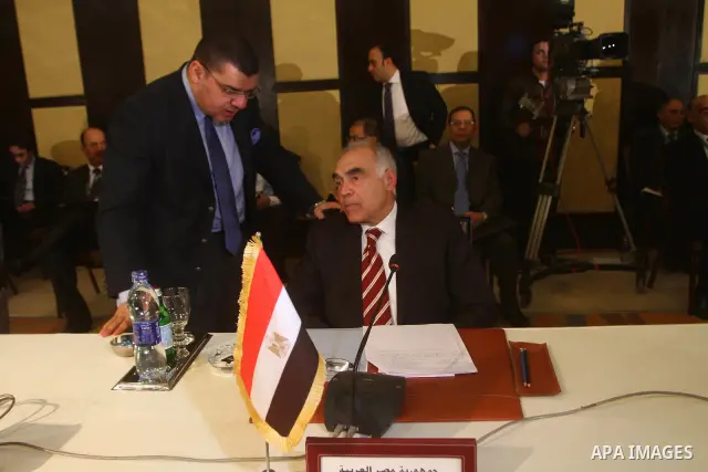 Egyptian Foreign Minister Mohammed Amro attends a ministerial meeting at the Arab League headquarters on Syria in Cairo on November 24, 2011. Arab foreign ministers have invited Syria to sign an agreement by November 25...