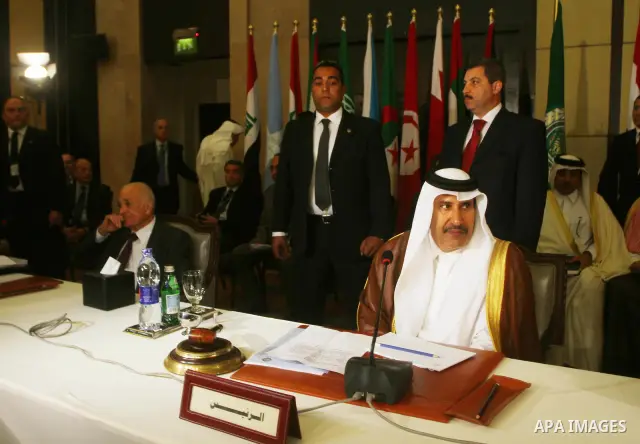 Qatar's Prime Minister and Foreign Minister Sheikh Hamad bin Jassim al-Thani attends a ministerial meeting at the Arab League headquarters on Syria in Cairo on November 24, 2011. Arab foreign ministers have invited Syria...
