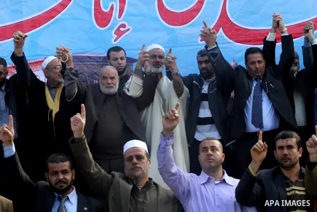 Palestinian prime minister in Gaza Strip, Ismail Haniya joins supporters in a rally in Gaza City to show their solidarity for Al-Aqsa mosque in Jerusalem November 25, 2011. The mosque built on the compound known to Musli...