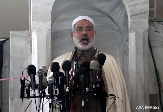 Palestinian prime minister in Gaza Strip, Ismail Haniya speaks during Friday prayers to supporters gathering for a rally in Gaza City to show their solidarity for Al-Aqsa mosque in Jerusalem November 25, 2011. The mosque...