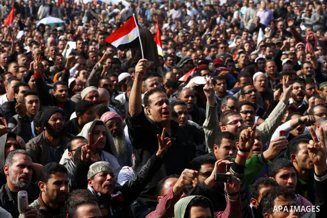 Egyptian demonstrators take part in a mass rally in Cairo's landmark Tahrir square on November 25, 2011 to demand an end to the military rule. The head of the military council tasked 79-year-old Kamal al-Ganzuri, who was...