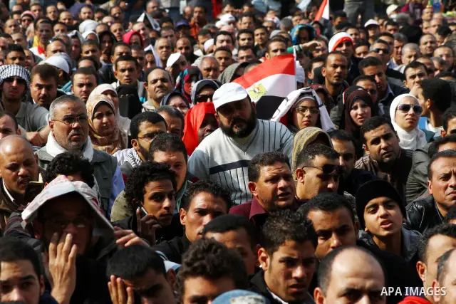 Egyptian demonstrators take part in a mass rally in Cairo's landmark Tahrir square on November 25, 2011 to demand an end to the military rule. The head of the military council tasked 79-year-old Kamal al-Ganzuri, who was...