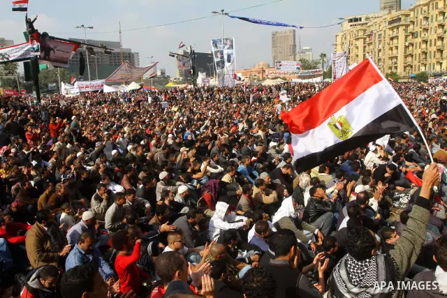 Egyptian demonstrators take part in a mass rally in Cairo's landmark Tahrir square on November 25, 2011 to demand an end to the military rule. The head of the military council tasked 79-year-old Kamal al-Ganzuri, who was...