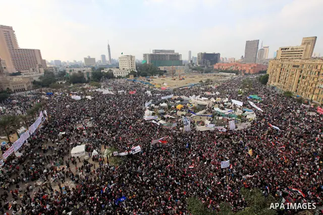 Egyptian demonstrators take part in a mass rally in Cairo's landmark Tahrir square on November 25, 2011 to demand an end to the military rule. The head of the military council tasked 79-year-old Kamal al-Ganzuri, who was...