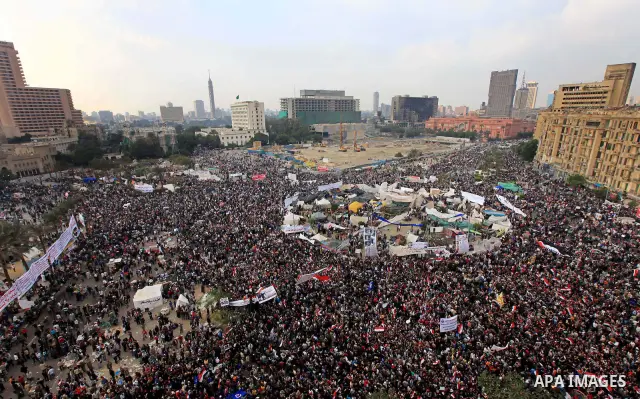 Egyptian demonstrators take part in a mass rally in Cairo's landmark Tahrir square on November 25, 2011 to demand an end to the military rule. The head of the military council tasked 79-year-old Kamal al-Ganzuri, who was...