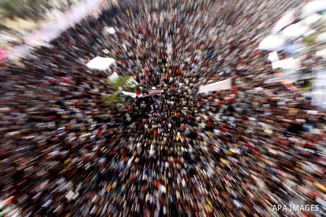 Egyptian protesters pray during a mass rally in Cairo's landmark Tahrir square on November 25, 2011 to demand an end to the military rule. The head of the military council tasked 79-year-old Kamal al-Ganzuri, who was pre...