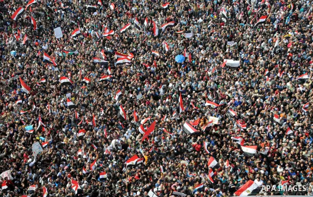 Egyptian demonstrators take part in a mass rally in Cairo's landmark Tahrir square on November 25, 2011 to demand an end to the military rule. The head of the military council tasked 79-year-old Kamal al-Ganzuri, who was...