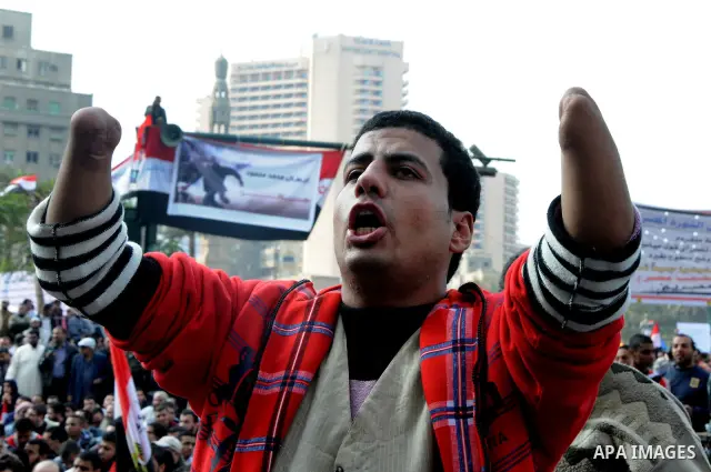 Egyptian protesters pray during a mass rally in Cairo's landmark Tahrir square on November 25, 2011 to demand an end to the military rule. The head of the military council tasked 79-year-old Kamal al-Ganzuri, who was pre...