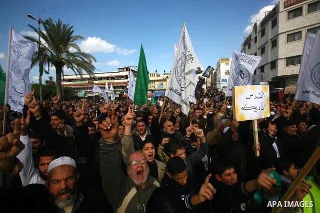 Palestinian Hamas supporters take part in a rally in Gaza City to show their solidarity for Al-Aqsa mosque in Jerusalem November 25, 2011. The mosque built on the compound known to Muslims as al-Haram al-Sharif and to Je...