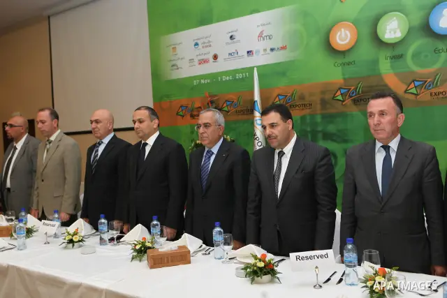 Palestinian Prime Minister Salam Fayyad participate in the opening of the Expotech gallery of information technology in the West Bank of Ramallah, on Nov. 27, 2011. Photo by Mustafa Abu Dayeh