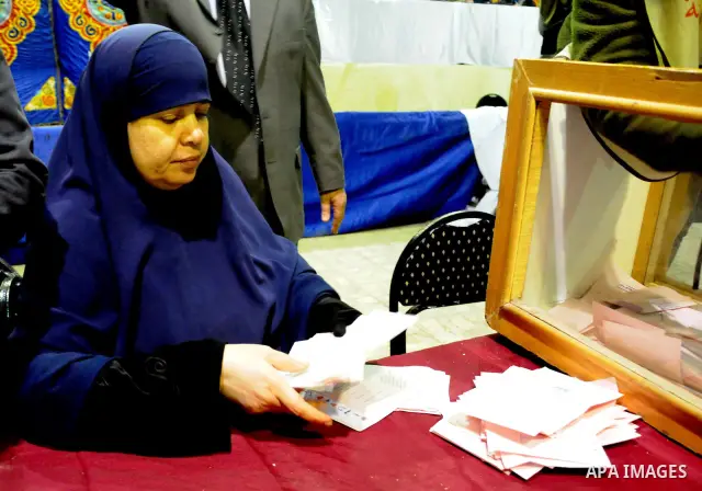 Election workers count ballots for the parliamentary elections in Luxor, Egypt, Tuesday, Nov. 29, 2011. Egypt's military rulers are taking credit for the strong turnout in the country's first parliamentary elections sinc...