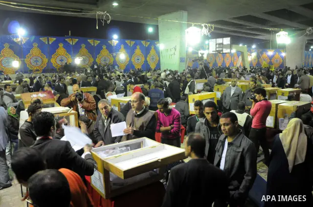 Election workers count ballots for the parliamentary elections in Luxor, Egypt, Tuesday, Nov. 29, 2011. Egypt's military rulers are taking credit for the strong turnout in the country's first parliamentary elections sinc...