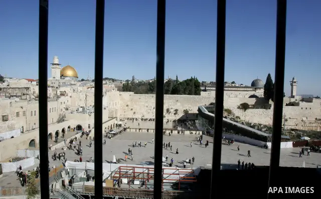 A wooden bridge leading to the Al Aqsa Mosque compound, known by the Jews as the Temple Mount is seen in Jerusalem's Old city, Monday, DEC. 01, 2011. An Israeli official says Prime Minister Benjamin Netanyahu has postpon...