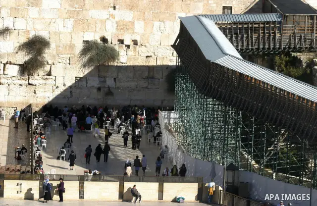 A wooden bridge leading to the Al Aqsa Mosque compound, known by the Jews as the Temple Mount is seen in Jerusalem's Old city, Monday, DEC. 01, 2011. An Israeli official says Prime Minister Benjamin Netanyahu has postpon...
