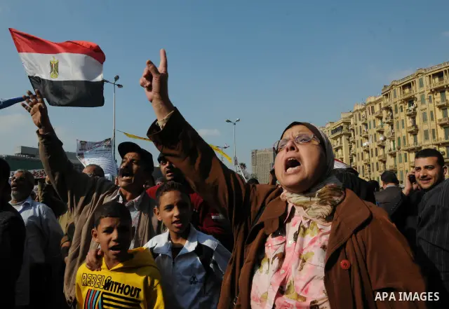 Egyptian protesters attend a demonstration in Tahrir Square, in Cairo, Egypt, Friday, Dec. 2, 2011. Islamists appear to have taken a strong majority of seats in the first round of Egypt's first parliamentary vote since H...