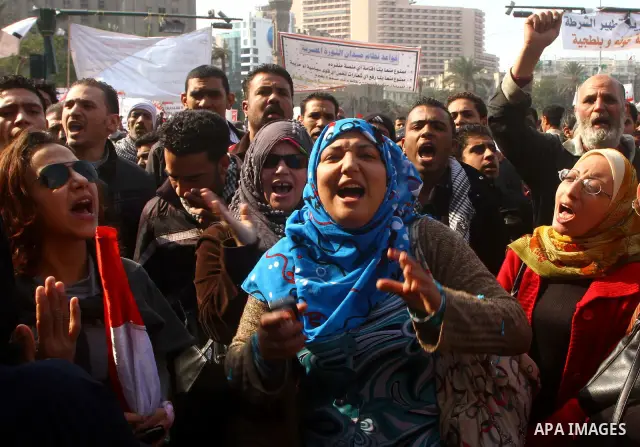 Egyptian protesters attend a demonstration in Tahrir Square, in Cairo, Egypt, Friday, Dec. 2, 2011. Islamists appear to have taken a strong majority of seats in the first round of Egypt's first parliamentary vote since H...