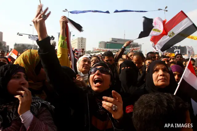 Egyptian protesters attend a demonstration in Tahrir Square, in Cairo, Egypt, Friday, Dec. 2, 2011. Islamists appear to have taken a strong majority of seats in the first round of Egypt's first parliamentary vote since H...