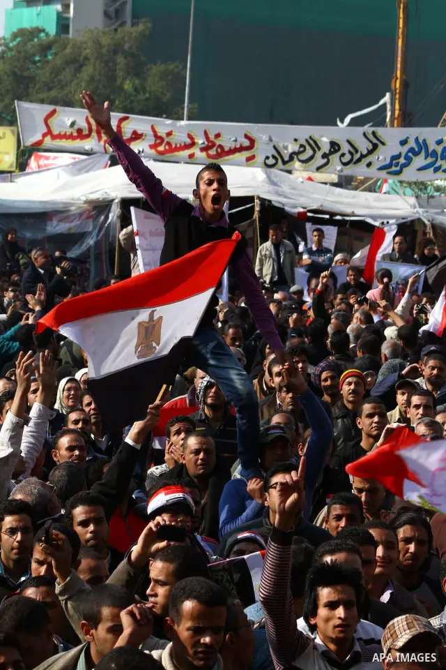 Egyptian protesters attend a demonstration in Tahrir Square, in Cairo, Egypt, Friday, Dec. 2, 2011. Islamists appear to have taken a strong majority of seats in the first round of Egypt's first parliamentary vote since H...