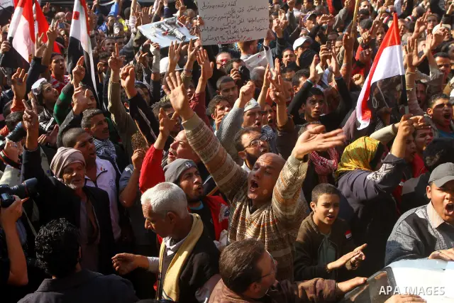 Egyptian protesters attend a demonstration in Tahrir Square, in Cairo, Egypt, Friday, Dec. 2, 2011. Islamists appear to have taken a strong majority of seats in the first round of Egypt's first parliamentary vote since H...