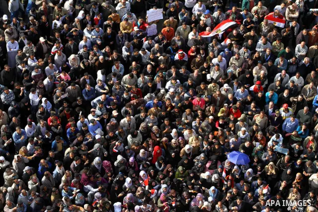 Egyptian protesters attend a demonstration in Tahrir Square, in Cairo, Egypt, Friday, Dec. 2, 2011. Islamists appear to have taken a strong majority of seats in the first round of Egypt's first parliamentary vote since H...