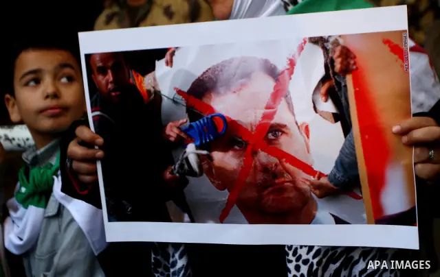 Syrians living in Egypt demonstrate against the recent actions of the Syrian government, in Cairo, Egypt on Dec 03,2011. Photo by Ashraf Amra