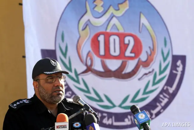 Head of the Palestinian civil defence, Youseef al-Zahar speaks as firefighters demonstrate thier skills during a training session following the campaign "your Safety", in Gaza city on Dec. 04, 2011. Photo by Mohammed Asa...