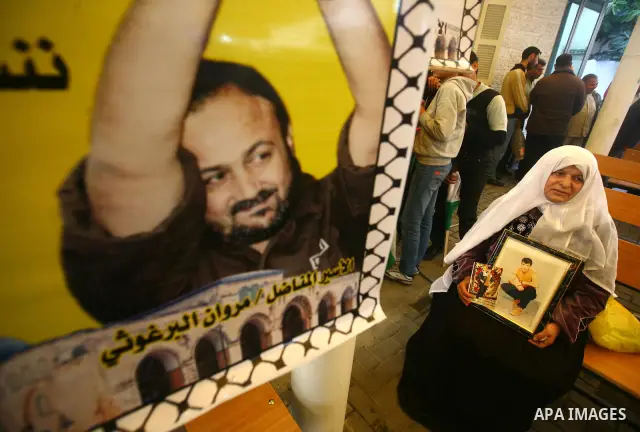 Palestinians gather during a protest at the Red Cross' offices in Gaza City to call for the release of Palestinian prisoners held in Israeli jails, on Dec. 05, 2011.. Photo by Majdi Fathi