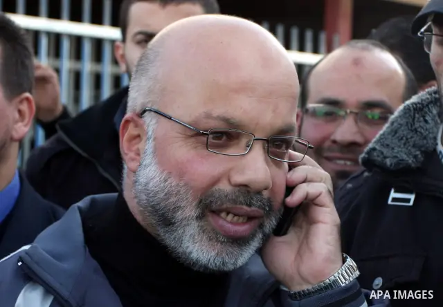 Palestinian lawmaker from Hamas , Ahmed Attoun, being welcomed by his friends at Kalandia checkpoint leading from Jerusalem to Ramallah, 06 December 2011, after his release from an Israeli jail. Atawni is a resident of E...