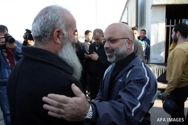 Palestinian lawmaker from Hamas , Ahmed Attoun, being welcomed by his friends at Kalandia checkpoint leading from Jerusalem to Ramallah, 06 December 2011, after his release from an Israeli jail. Atawni is a resident of E...