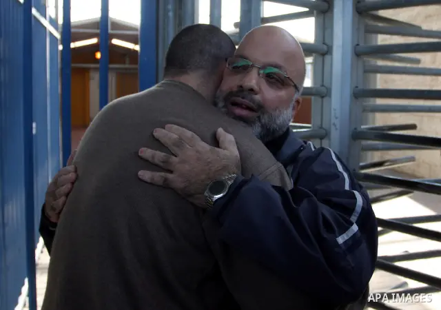 Palestinian lawmaker from Hamas , Ahmed Attoun, being welcomed by his friends at Kalandia checkpoint leading from Jerusalem to Ramallah, 06 December 2011, after his release from an Israeli jail. Atawni is a resident of E...