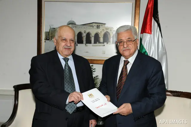 Palestinian President, Mahmoud Abbas (Abu Mazen) meets with President of the Anti-Corruption Commission, Rafik El-Natsha, in the West Bank City of Ramallah. Photo by Mufeed Abu Hasna