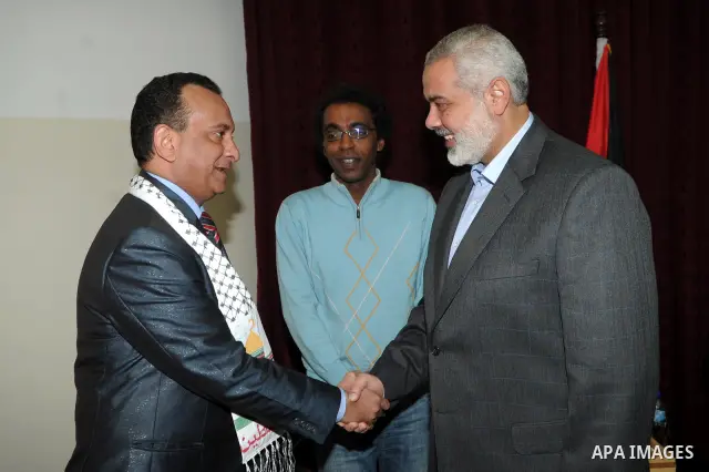Palestinian prime minister in Gaza Strip, Ismail Haniya meets with the members of Arab delegation at his office in Gaza city on Dec. 7,2011. Photo by Ahmed Shaat