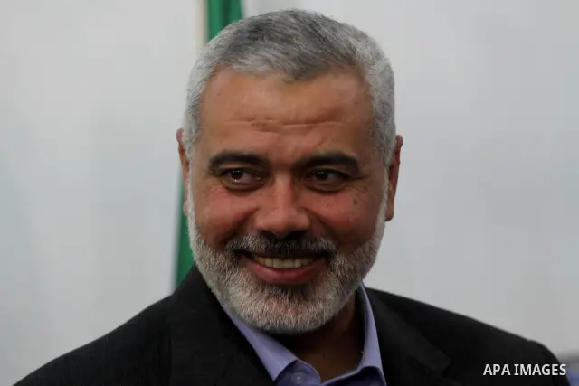Palestinian prime minister in Gaza Strip, Ismail Haniya attends the wedding party of the freed Palestinian prisoner Mohammed Hamada from Jerusalem, who released from an Israeli jail during the swap with the Israeli soldi...