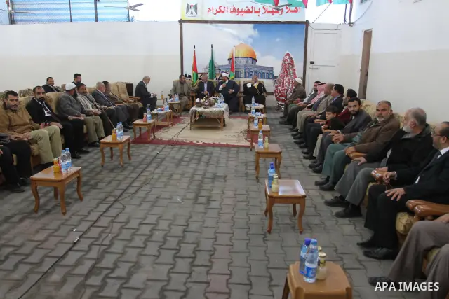 Palestinian prime minister in Gaza Strip, Ismail Haniya attends the wedding party of the freed Palestinian prisoner Mohammed Hamada from Jerusalem, who released from an Israeli jail during the swap with the Israeli soldi...