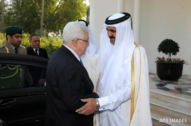 Palestinian President Mahmoud Abbas (Abu Mazen) meets with the emir of Qatar Sheikh Hamad bin Khalifa al-Thani, in Qatar on Dec. 9,2011. Photo by Thaer Ganaim