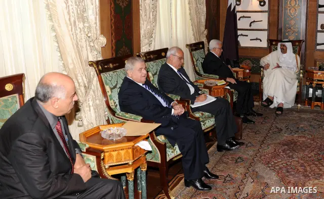 Palestinian President Mahmoud Abbas (Abu Mazen) meets with the emir of Qatar Sheikh Hamad bin Khalifa al-Thani, in Qatar on Dec. 9,2011. Photo by Thaer Ganaim