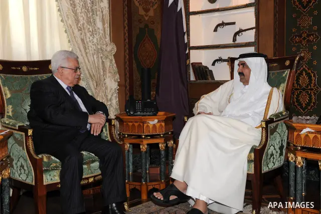 Palestinian President Mahmoud Abbas (Abu Mazen) meets with the emir of Qatar Sheikh Hamad bin Khalifa al-Thani, in Qatar on Dec. 9,2011. Photo by Thaer Ganaim
