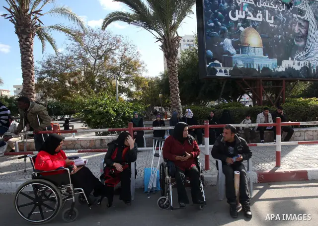 Palestinians Disabled take part in a protest in front of the Palestinian Legislative Council in Gaza City on Dec. 10, 2011. Photo by Yaser Fathi