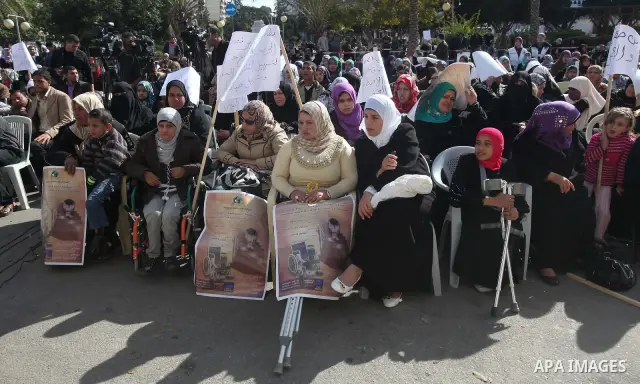 Palestinians Disabled take part in a protest in front of the Palestinian Legislative Council in Gaza City on Dec. 10, 2011. Photo by Yaser Fathi