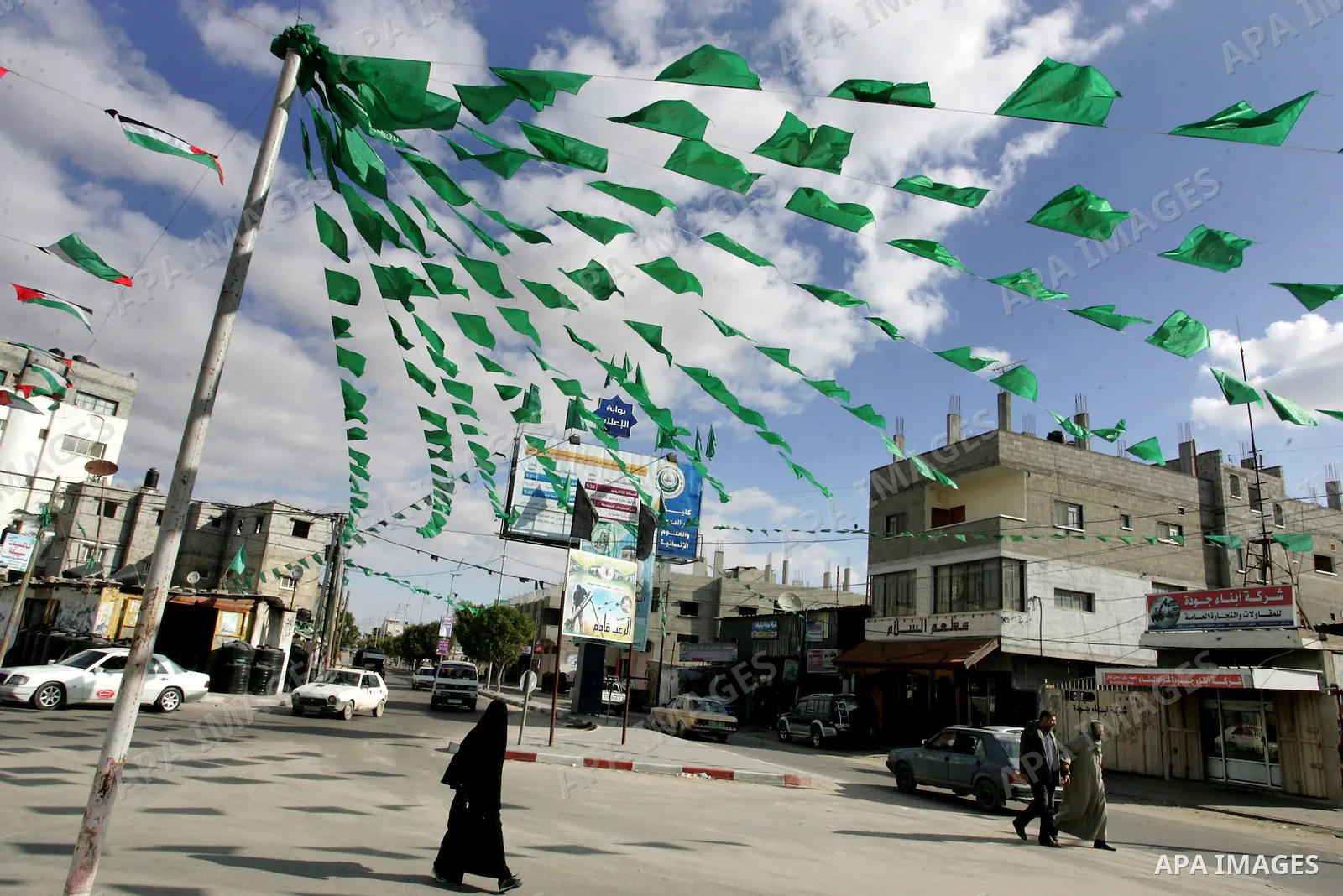 Palestine and Hamas Flags adorn the streets in the preparation of the anniversary of Hamas Islamic movement foundation in refugee camp of Rafah in southern Gaza Strip on December 10, 2011. Photo by Abed Rahim Khatib. Pho...