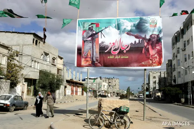 Palestine and Hamas Flags adorn the streets in the preparation of the anniversary of Hamas Islamic movement foundation in refugee camp of Rafah in southern Gaza Strip on December 10, 2011. Photo by Abed Rahim Khatib. Pho...