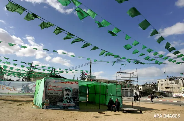 Palestine and Hamas Flags adorn the streets in the preparation of the anniversary of Hamas Islamic movement foundation in refugee camp of Rafah in southern Gaza Strip on December 10, 2011. Photo by Abed Rahim Khatib. Pho...