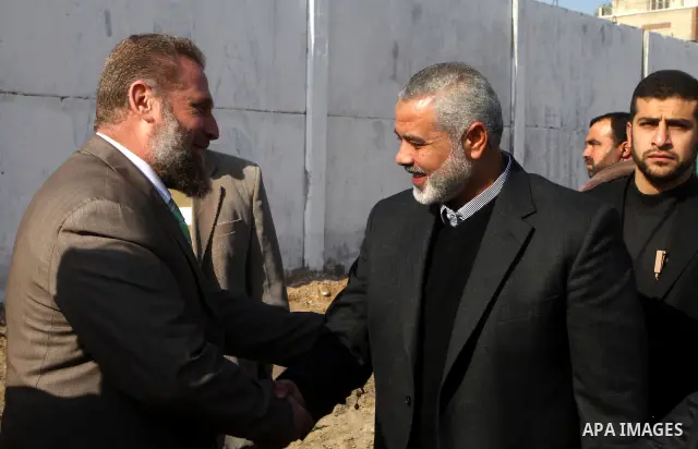 Palestinian Prime Minister in Gaza, Ismail Haniya, lays foundation stone for the reconstruction of yafa secondary school in the neighborhood Al tofah in Gaza city on Dec.13, 2011. Photo by Ashraf Amra
