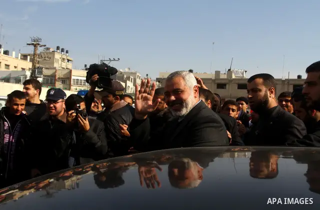 Palestinian Prime Minister in Gaza, Ismail Haniya, lays foundation stone for the reconstruction of yafa secondary school in the neighborhood Al tofah in Gaza city on Dec.13, 2011. Photo by Ashraf Amra