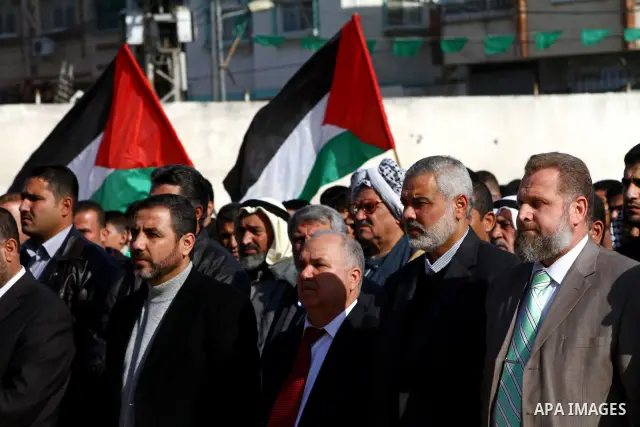 Palestinian Prime Minister in Gaza, Ismail Haniya, lays foundation stone for the reconstruction of yafa secondary school in the neighborhood Al tofah in Gaza city on Dec.13, 2011. Photo by Ashraf Amra