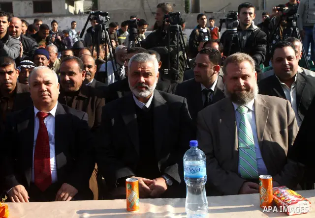 Palestinian Prime Minister in Gaza, Ismail Haniya, lays foundation stone for the reconstruction of yafa secondary school in the neighborhood Al tofah in Gaza city on Dec.13, 2011. Photo by Ashraf Amra