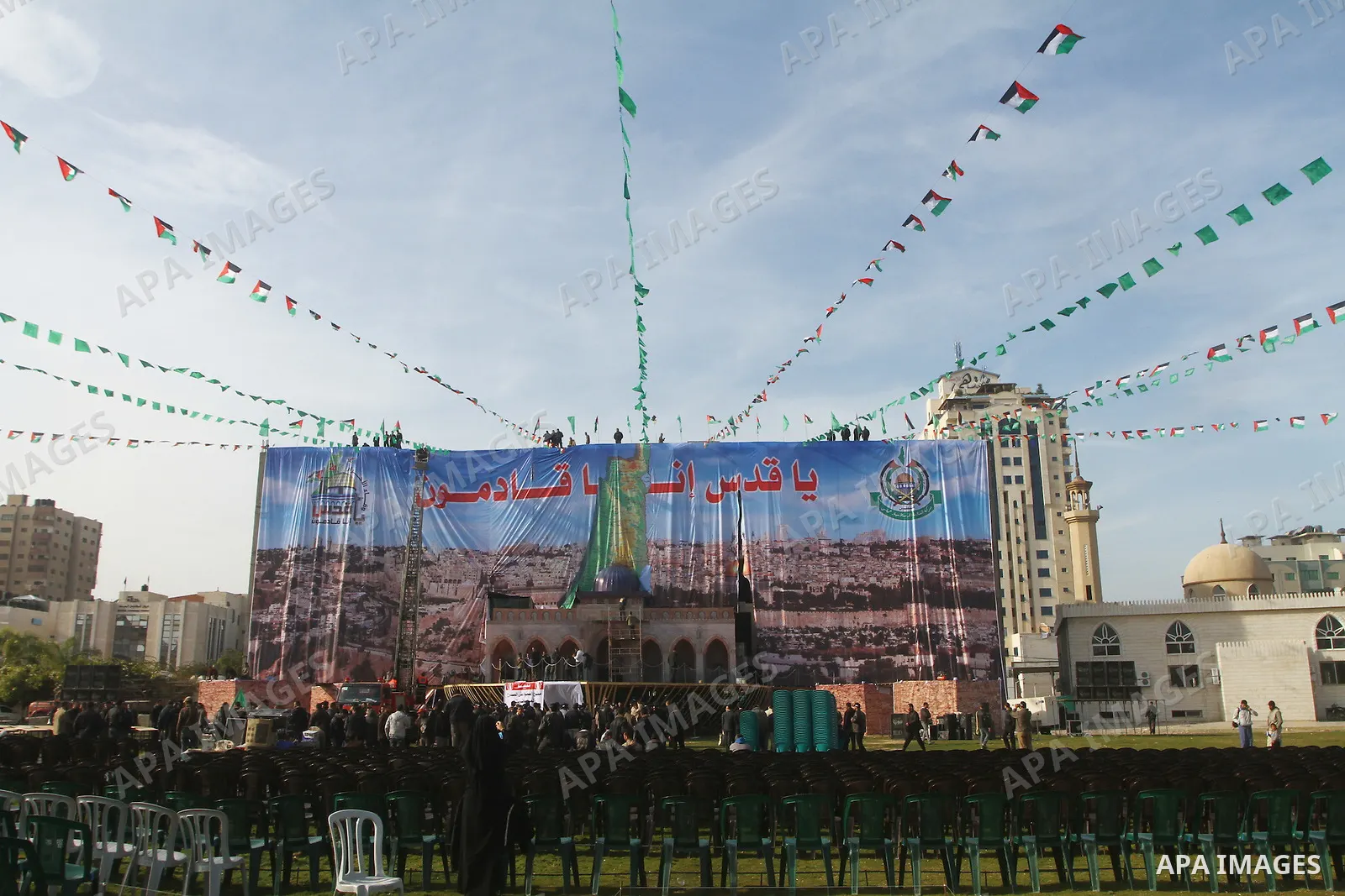 Palestinian members of Hamas prepare the court of "Qatiba" for the celebrations marking the Islamist movement's 24th founding anniversary, in Gaza city on Dec 13,2011. The main celebration will be held on December 14, th...