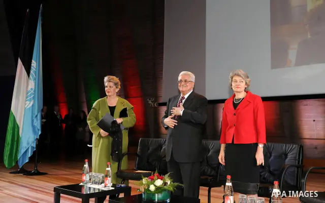 Palestinian President Mahmoud Abbas attends the Palestinian flag raising ceremony, at the UNESCO headquarters in Paris, Tuesday Dec. 13, 2011. Palestine was admitted as a member of the U.N. Educational, Scientific and Cu...