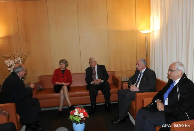 Palestinian President Mahmoud Abbas attends the Palestinian flag raising ceremony, at the UNESCO headquarters in Paris, Tuesday Dec. 13, 2011. Palestine was admitted as a member of the U.N. Educational, Scientific and Cu...