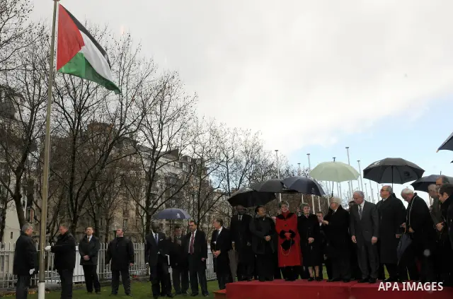 Palestinian President Mahmoud Abbas attends the Palestinian flag raising ceremony, at the UNESCO headquarters in Paris, Tuesday Dec. 13, 2011. Palestine was admitted as a member of the U.N. Educational, Scientific and Cu...